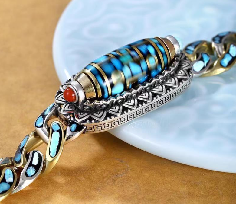 '+70% DE REDUCTION JUSQU'Ă CE SOIR 23H59mnđ„BRACELET DZI Ă NEUF YEUX ET MANTRA TURQUOISE - Belle Vue